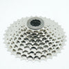 A silver DNP 9-speed cassette for bicycles, displayed on a white background.